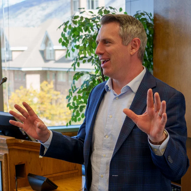 Tim Gubler discussing ideas with an audience